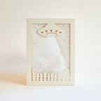 Decorative wall art with a UFO design on a white background