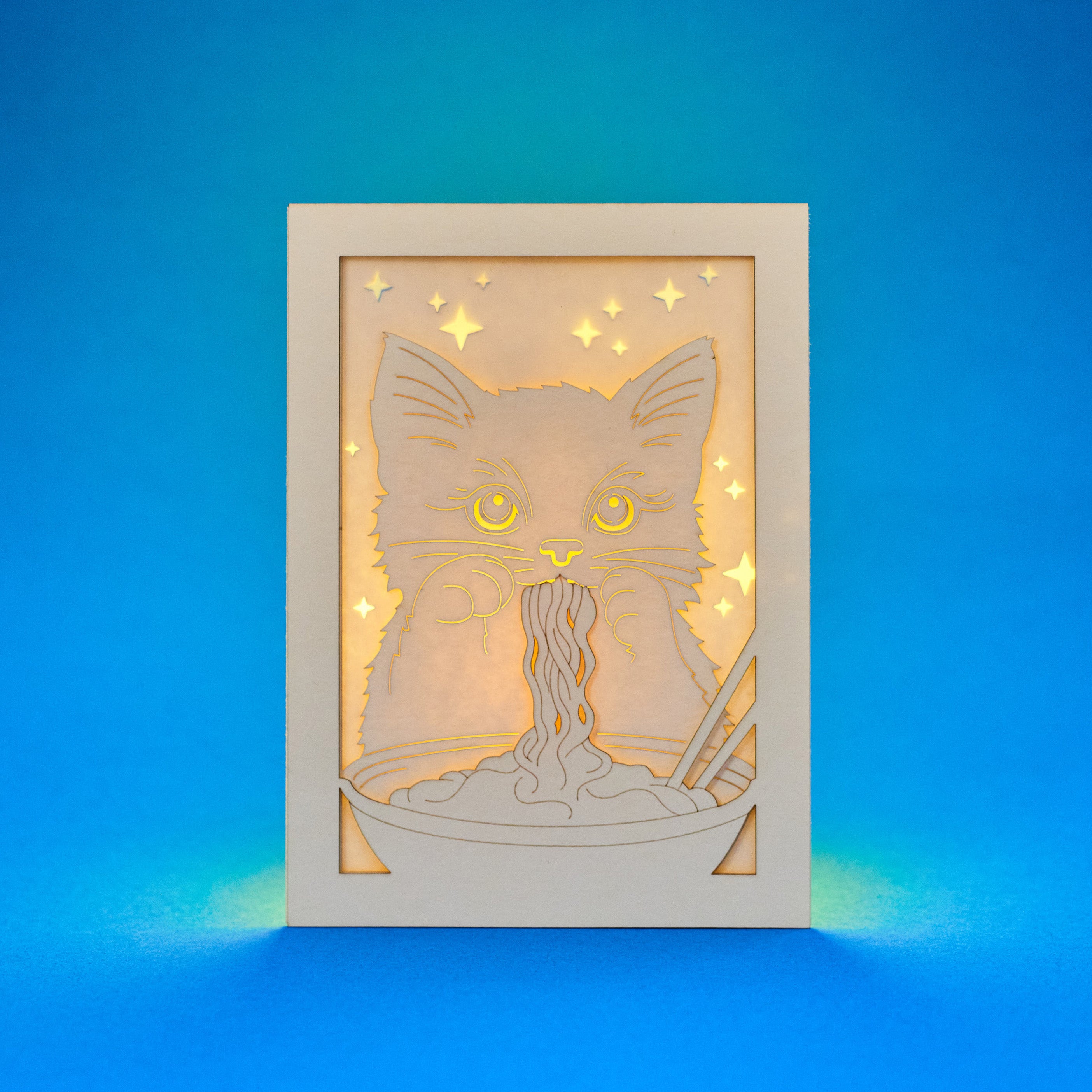 Adorable cat eating ramen noodles with chopsticks