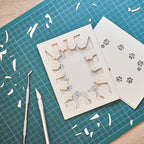 Circle of cat paws with plenty of space to add your wishes