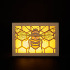 Realistic bee with delicate wings and honeycomb background