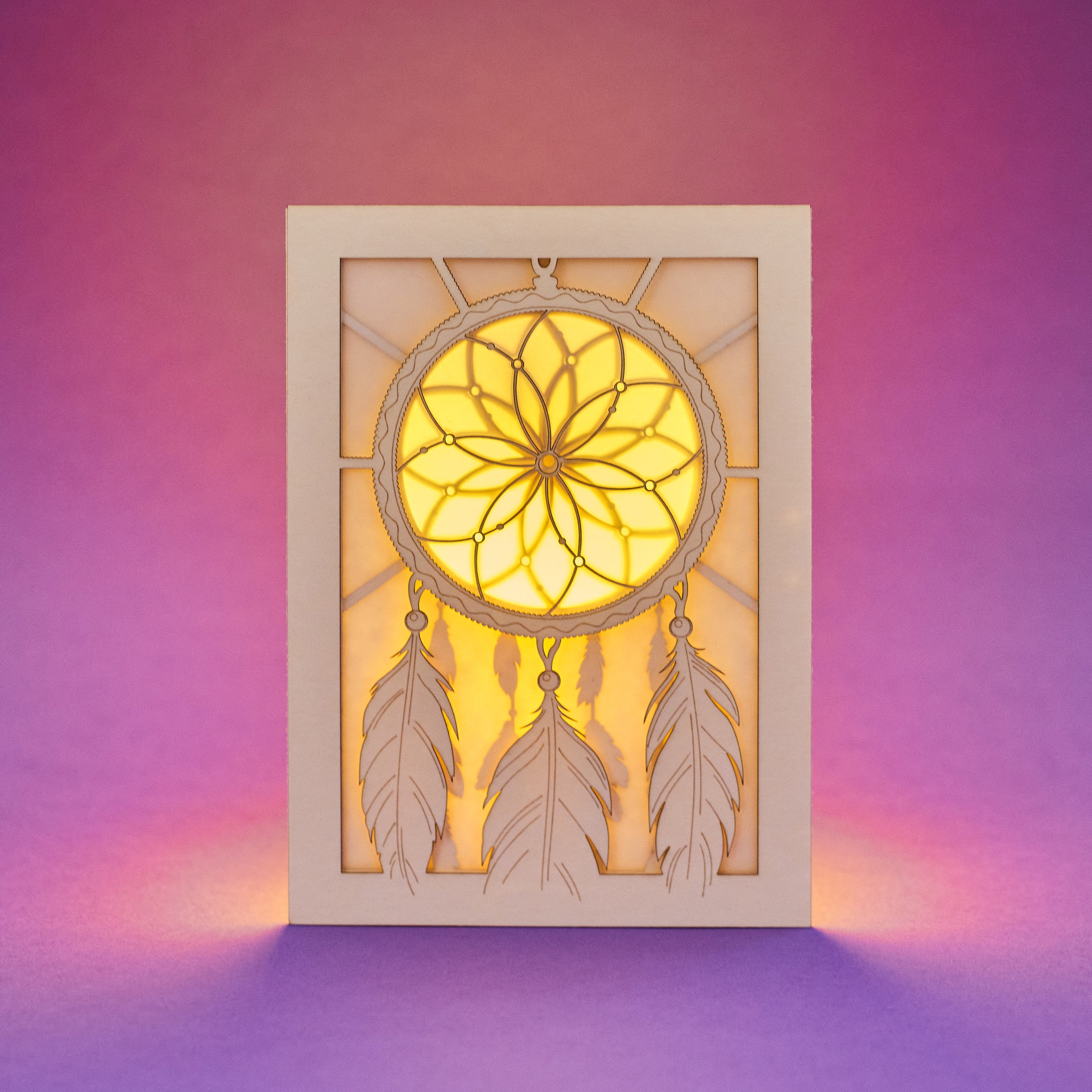 Dreamcatcher with beads feathers and intricate woven pattern