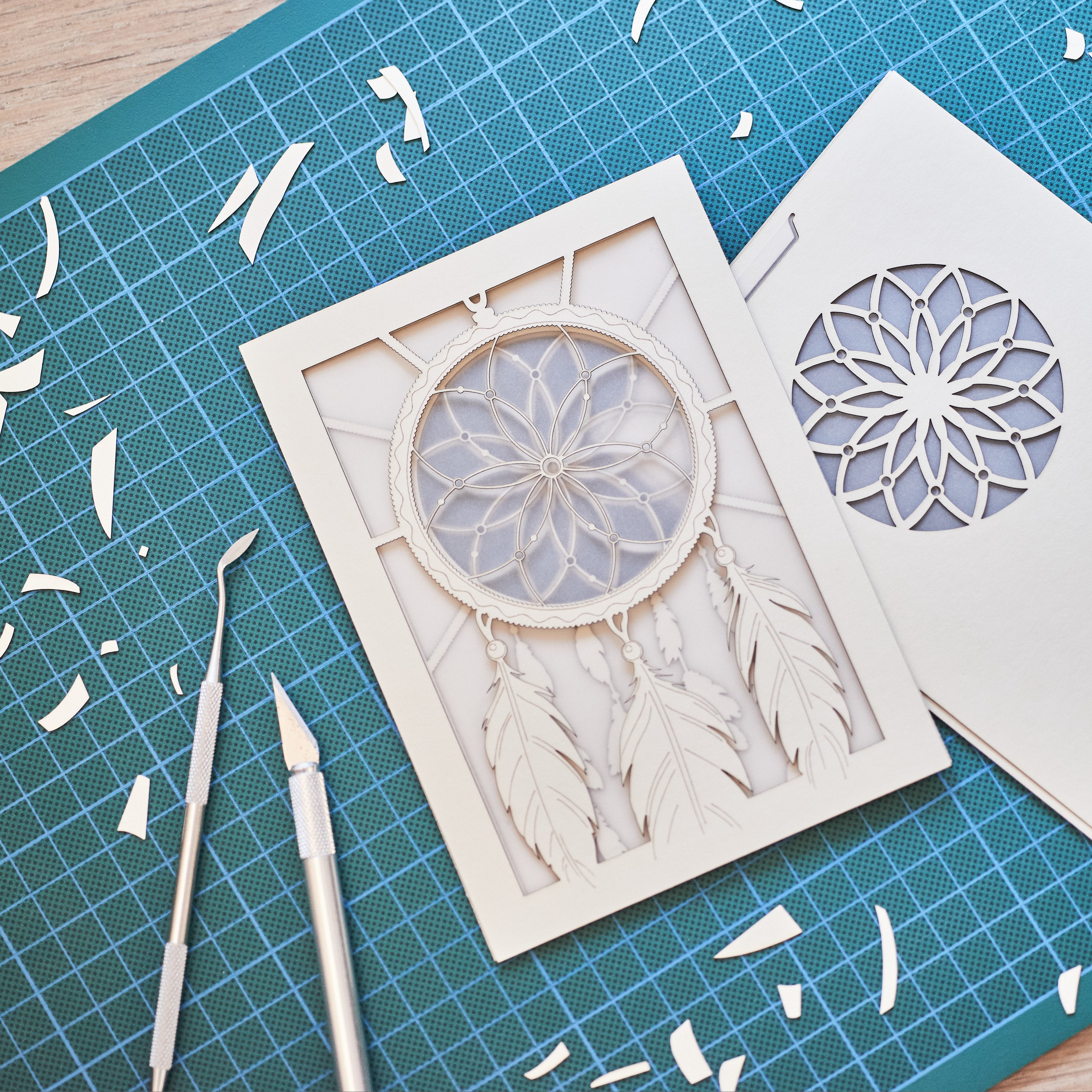 Dreamcatcher with beads feathers and intricate woven pattern