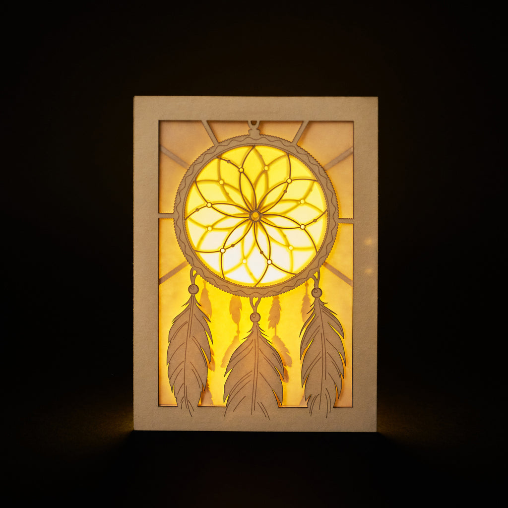 Dreamcatcher with beads feathers and intricate woven pattern