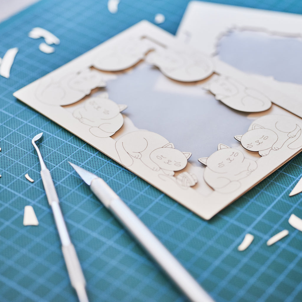 Adorable sleeping cats and kittens filling entire frame