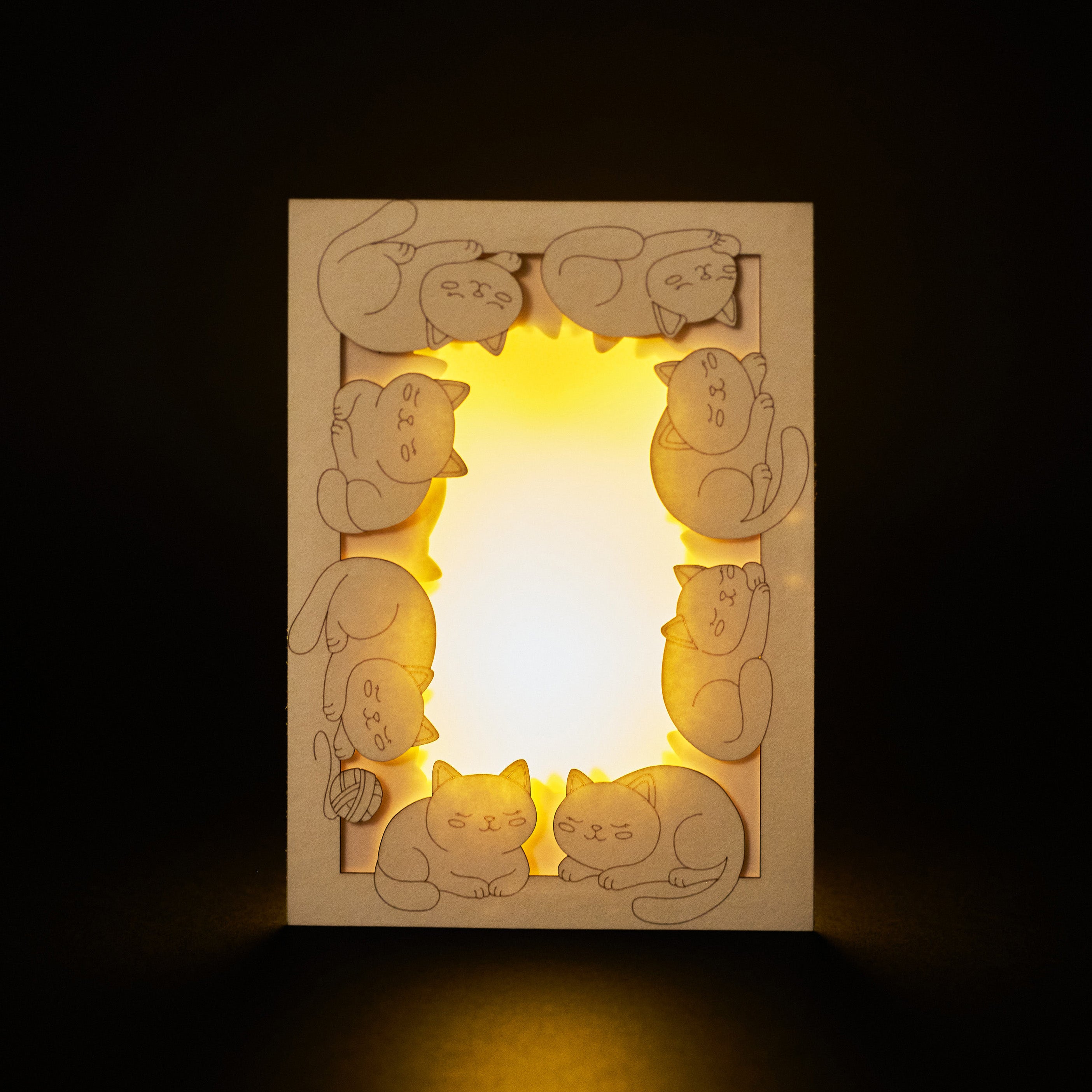 Adorable sleeping cats and kittens filling entire frame