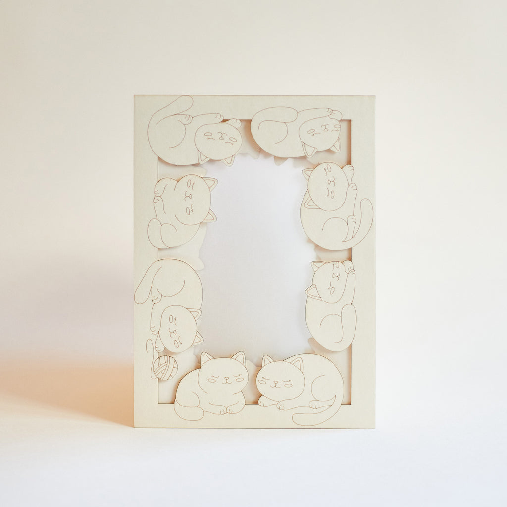 Adorable sleeping cats and kittens filling entire frame