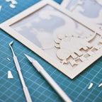 Adorable dinosaurs diplodocus and stegosaurus with birthday streamers and volcano