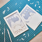 Adorable dinosaurs diplodocus and stegosaurus with birthday streamers and volcano