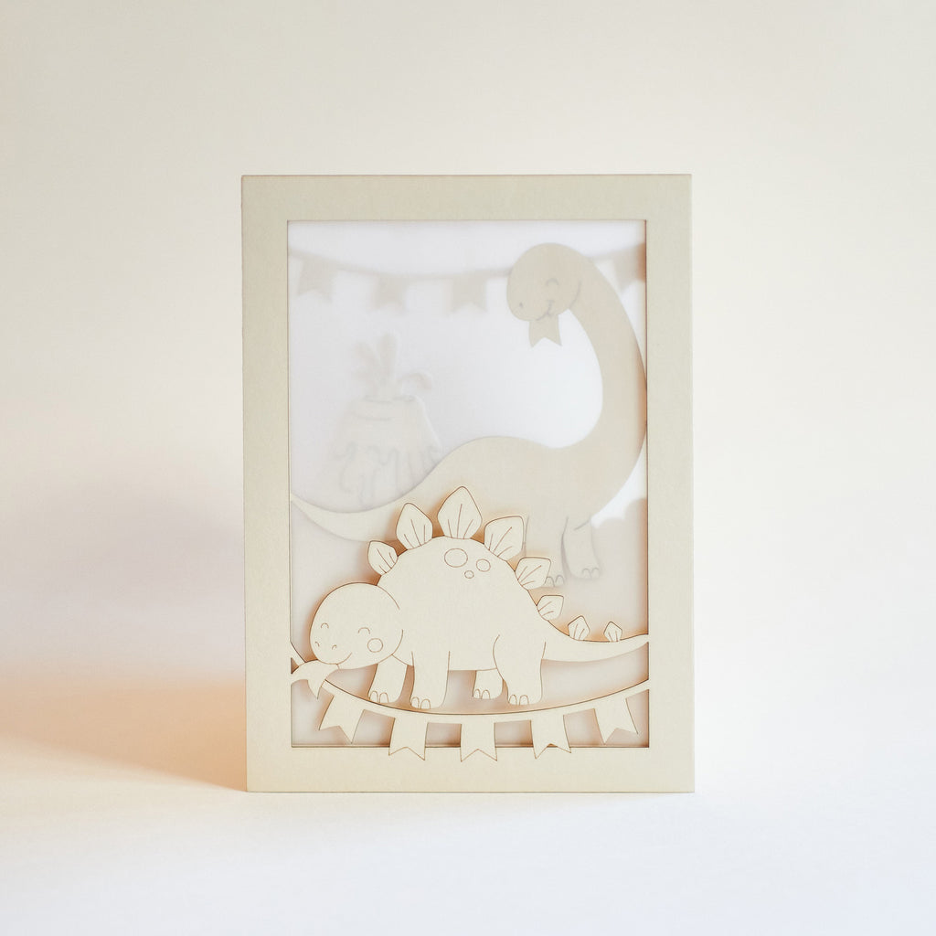 Adorable dinosaurs diplodocus and stegosaurus with birthday streamers and volcano