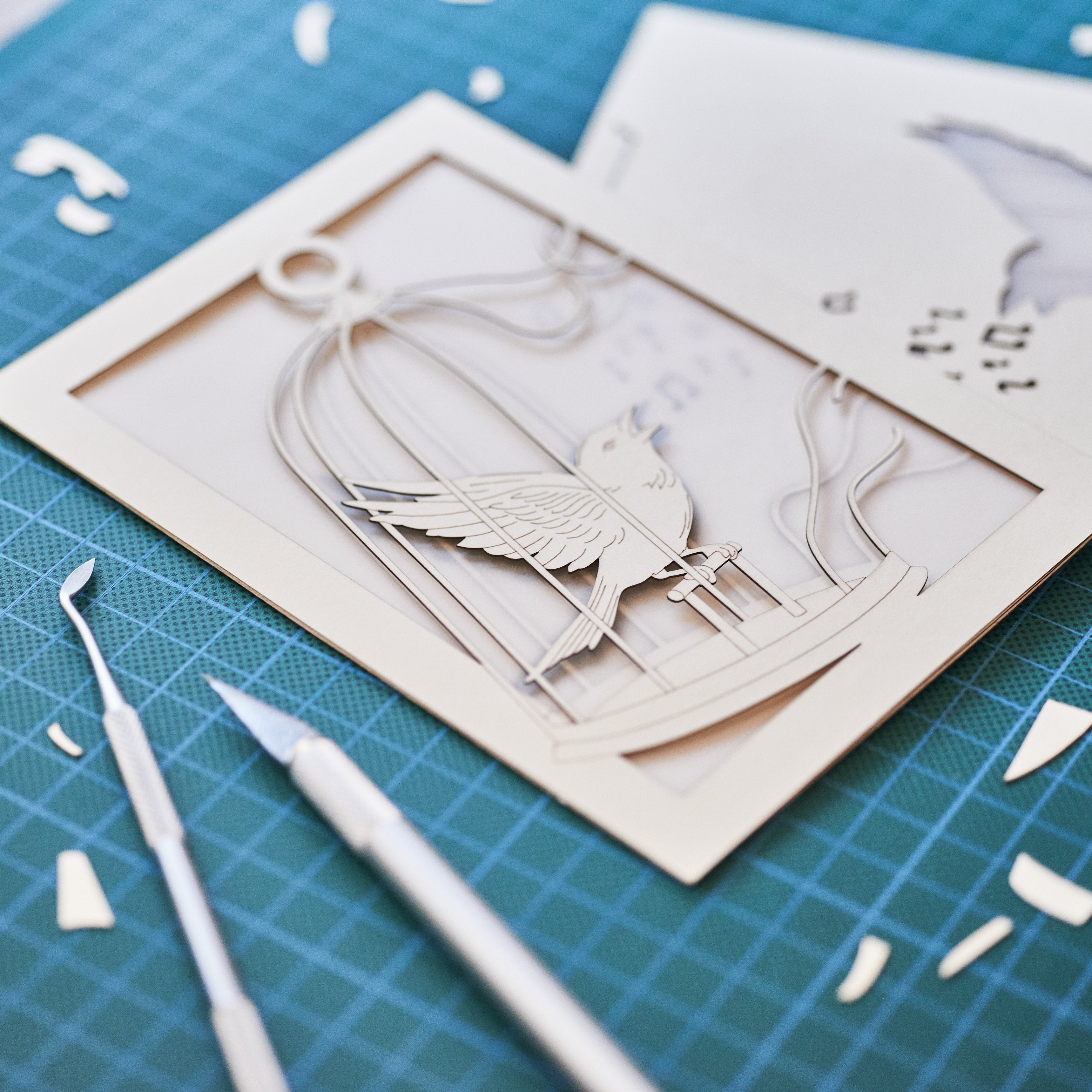 Bird escaping golden cage through song with broken bars