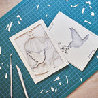 Bird escaping golden cage through song with broken bars