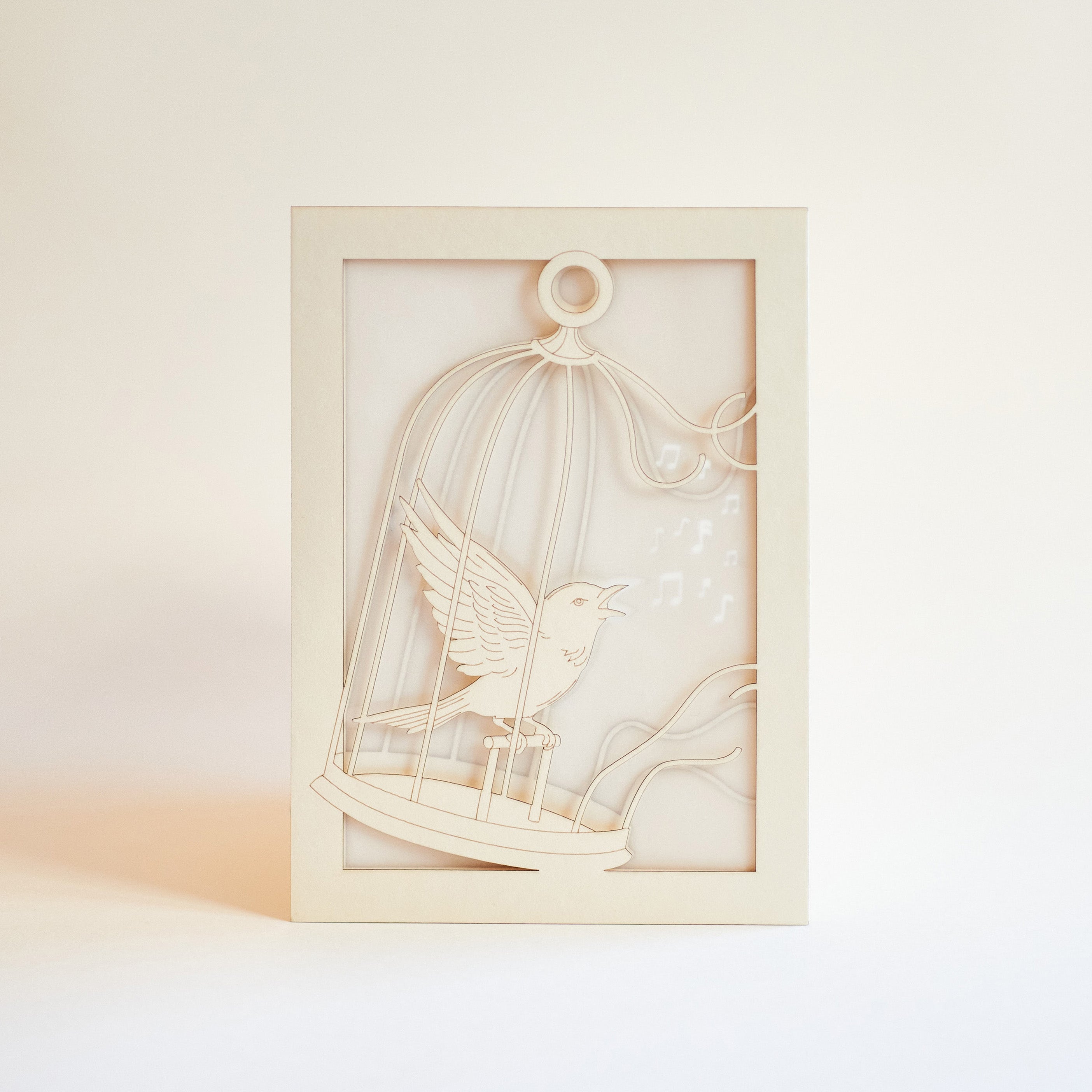 Bird escaping golden cage through song with broken bars