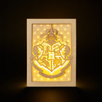 Hogwarts crest with magical details across three layers