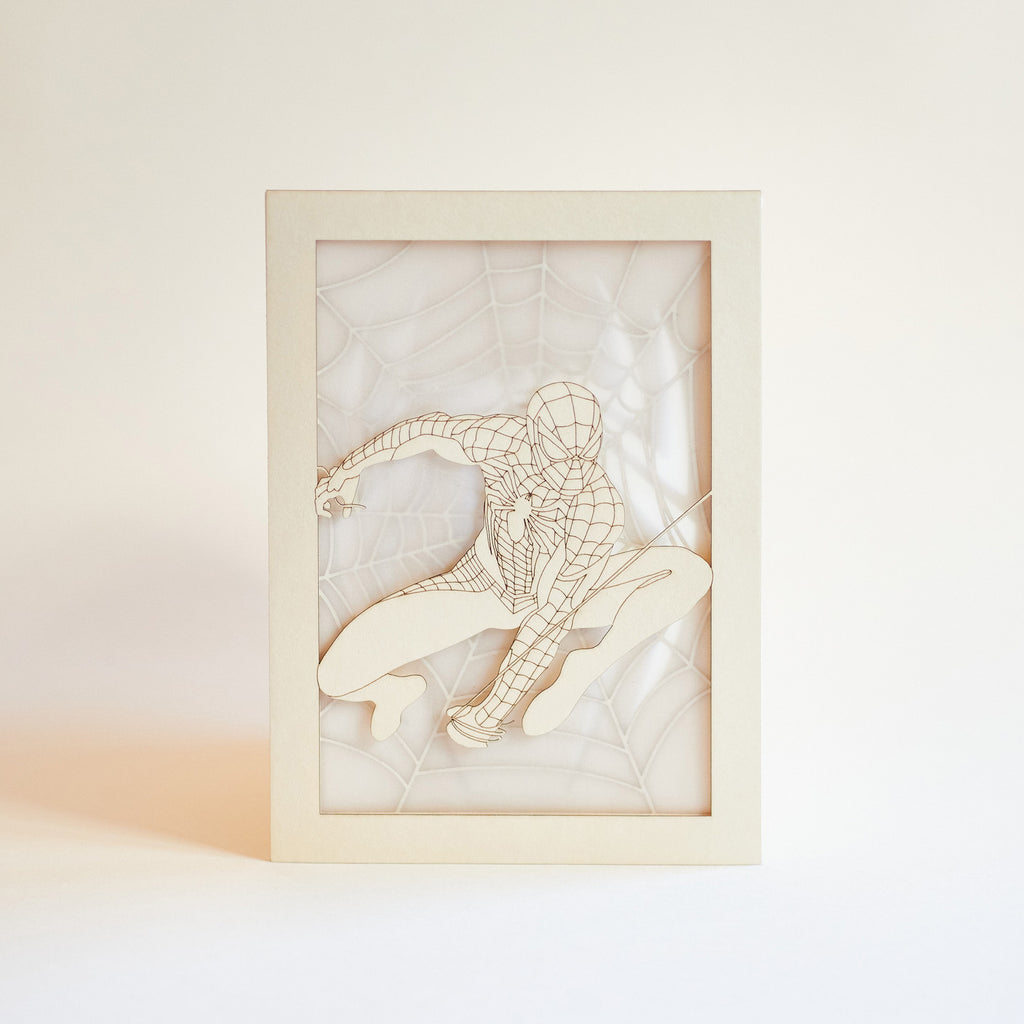 Spider-Man swinging on web with logo and intricate web design