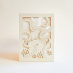 Ocean treasure chest with octopus tentacles and sea creatures