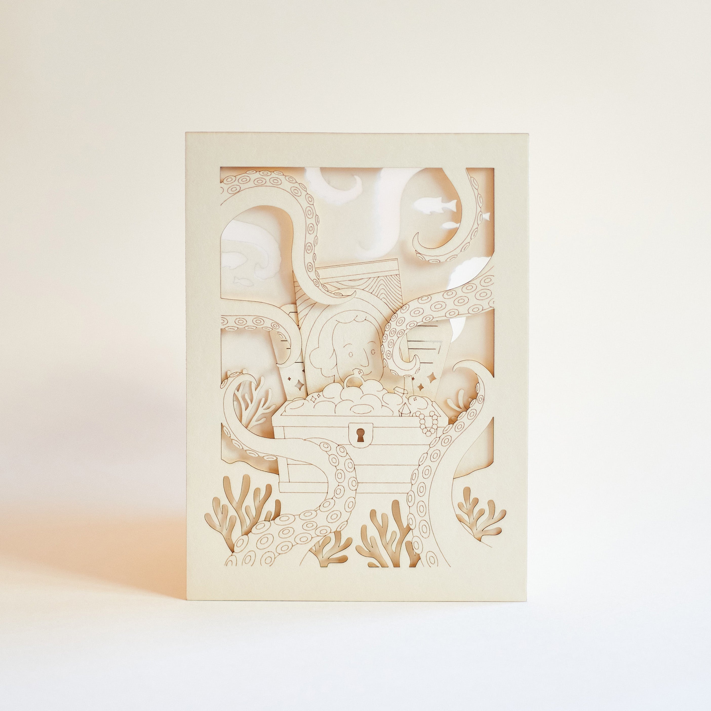 Ocean treasure chest with octopus tentacles and sea creatures