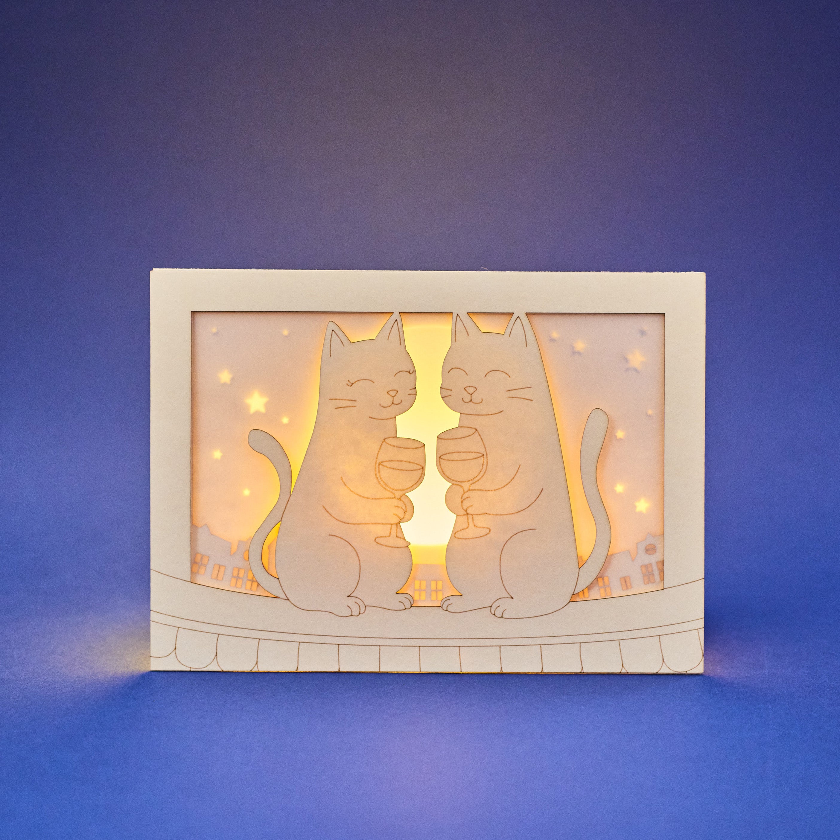 Two cats drinking wine on rooftop under moon with city view