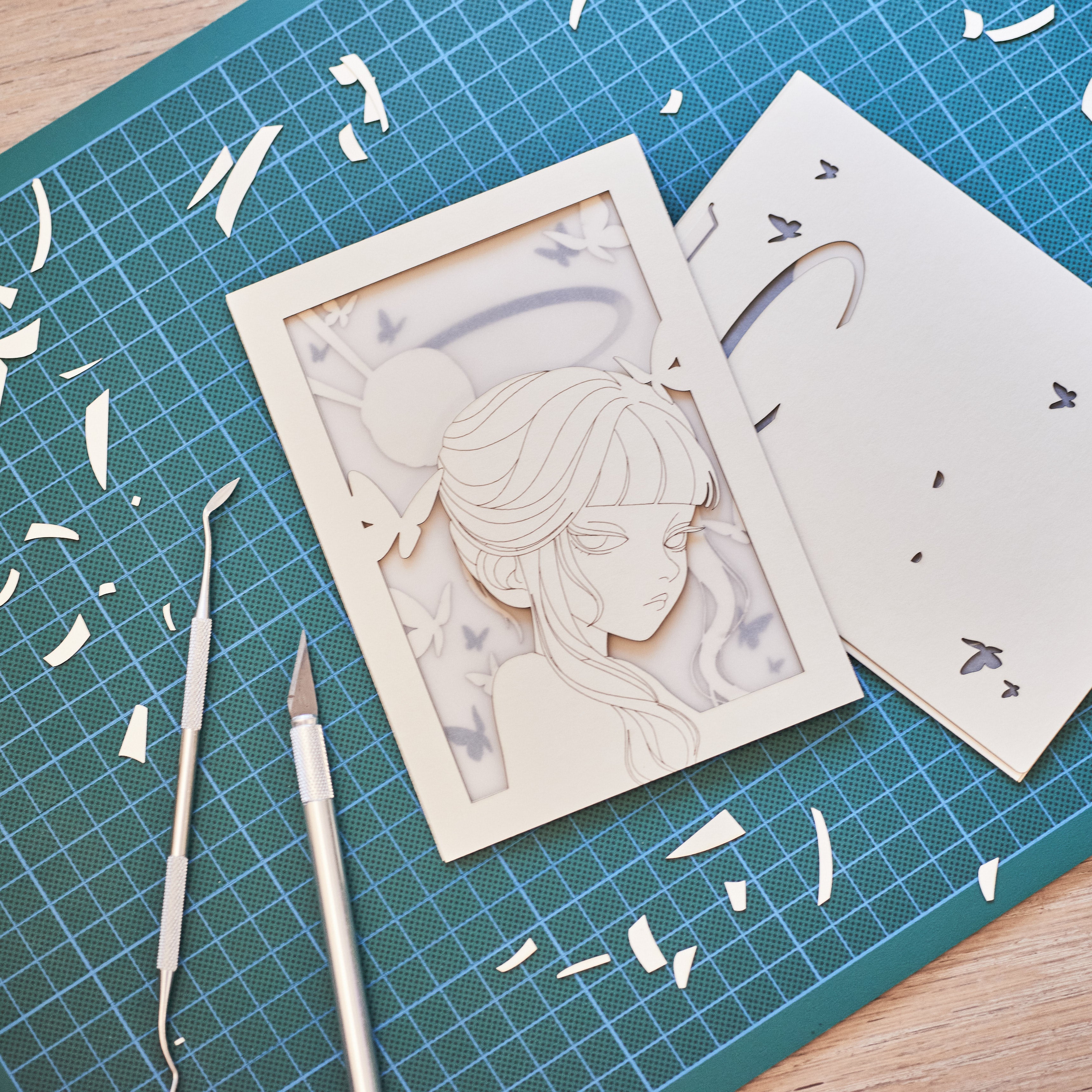 Minimalist anime girl with bun hairstyle halo and butterflies