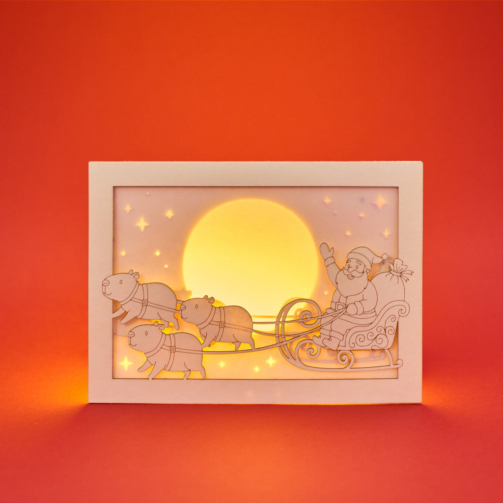 Santa Claus sleigh pulled by capybaras in Christmas night sky