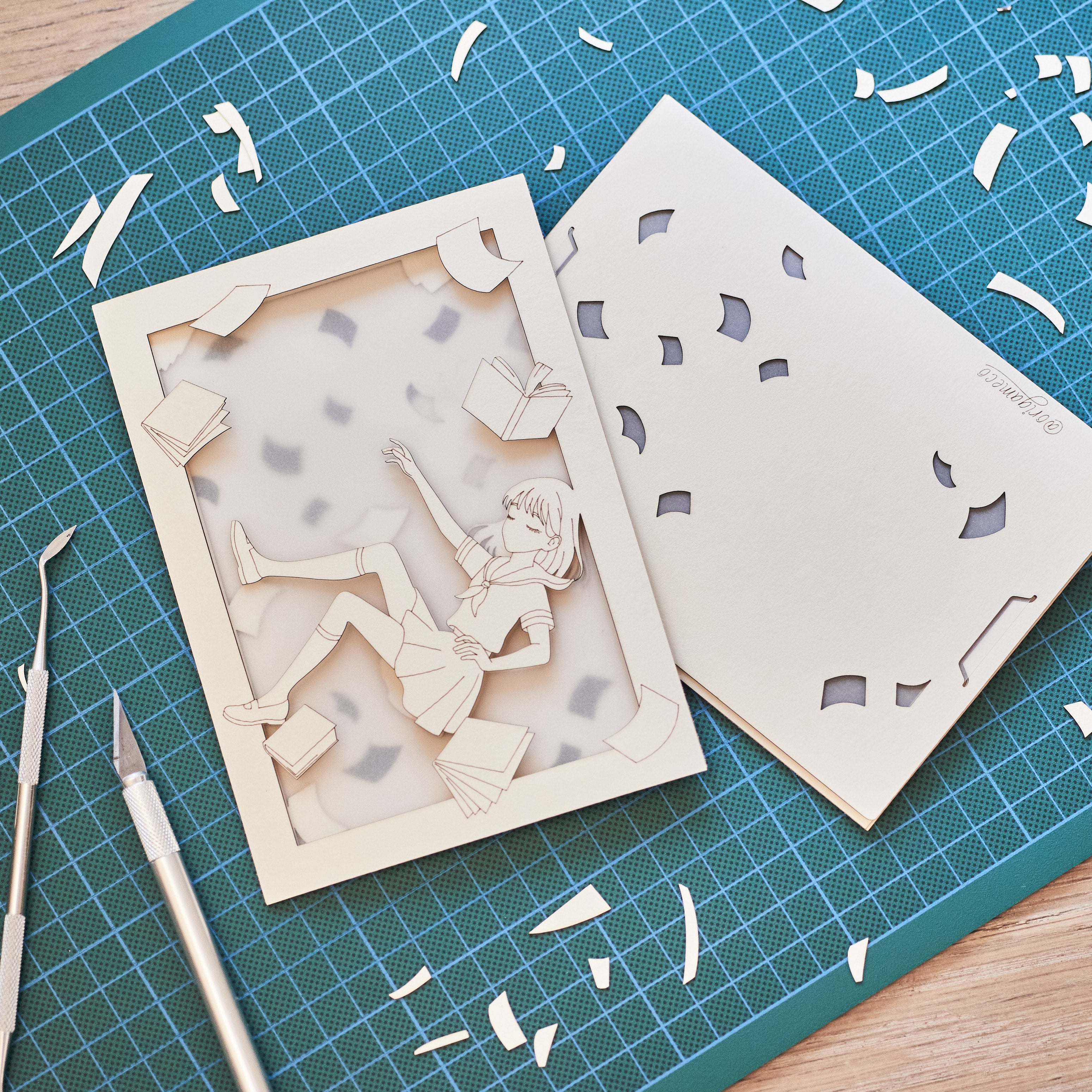 Anime schoolgirl falling amid books and textbooks