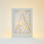 Christmas Forest Animals Card: Bunny and Squirrel Decorating Tree