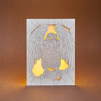 Gothic Raven Card: Dark Bird in Stone Arch with Glowing Eyes