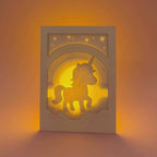 Chubby unicorn dancing under rainbow in clouds with stars