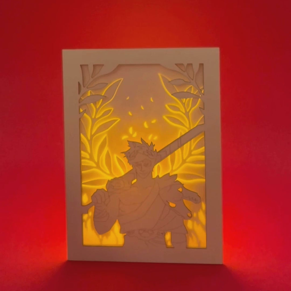 Zagreus from Hades game with sword standing in front of olive branches and flames