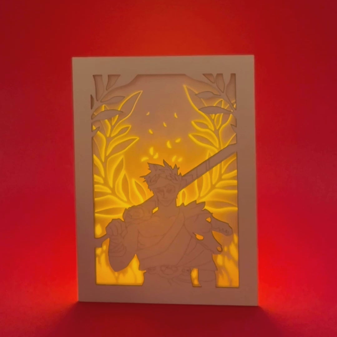 Zagreus from Hades game with sword standing in front of olive branches and flames