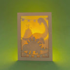 Adorable dinosaurs diplodocus and stegosaurus with birthday streamers and volcano