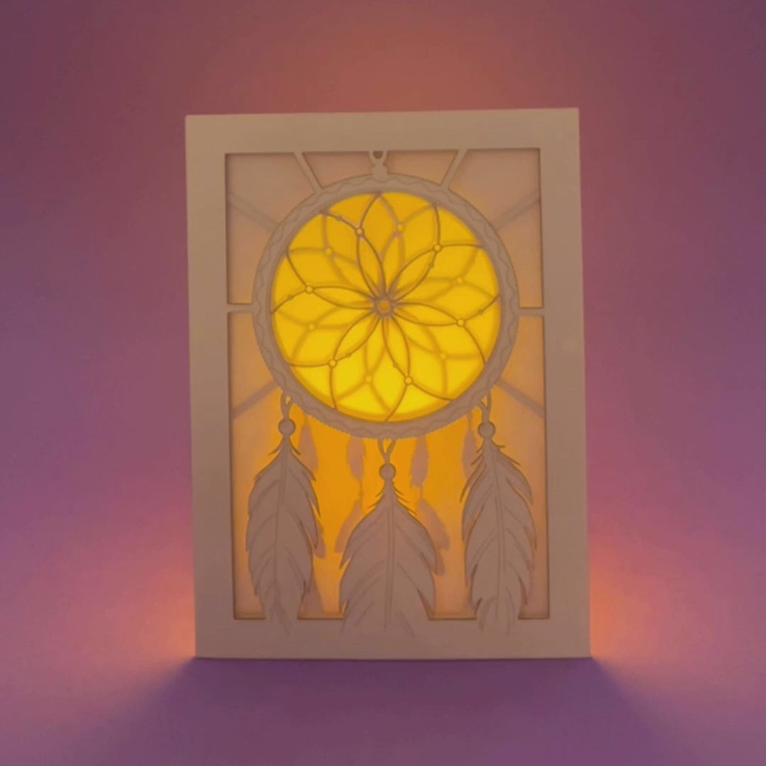 Dreamcatcher with beads feathers and intricate woven pattern