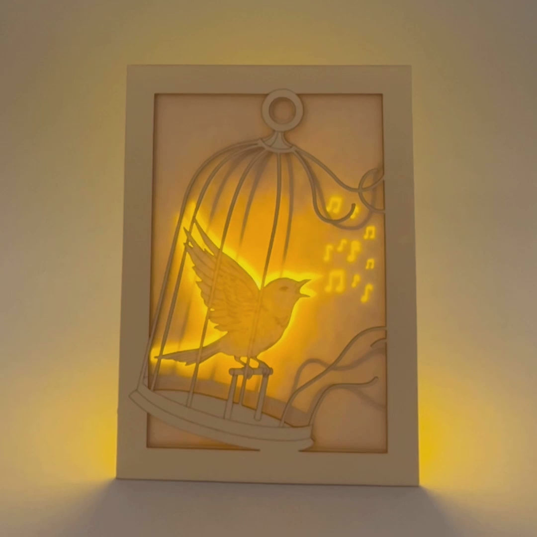 Bird escaping golden cage through song with broken bars