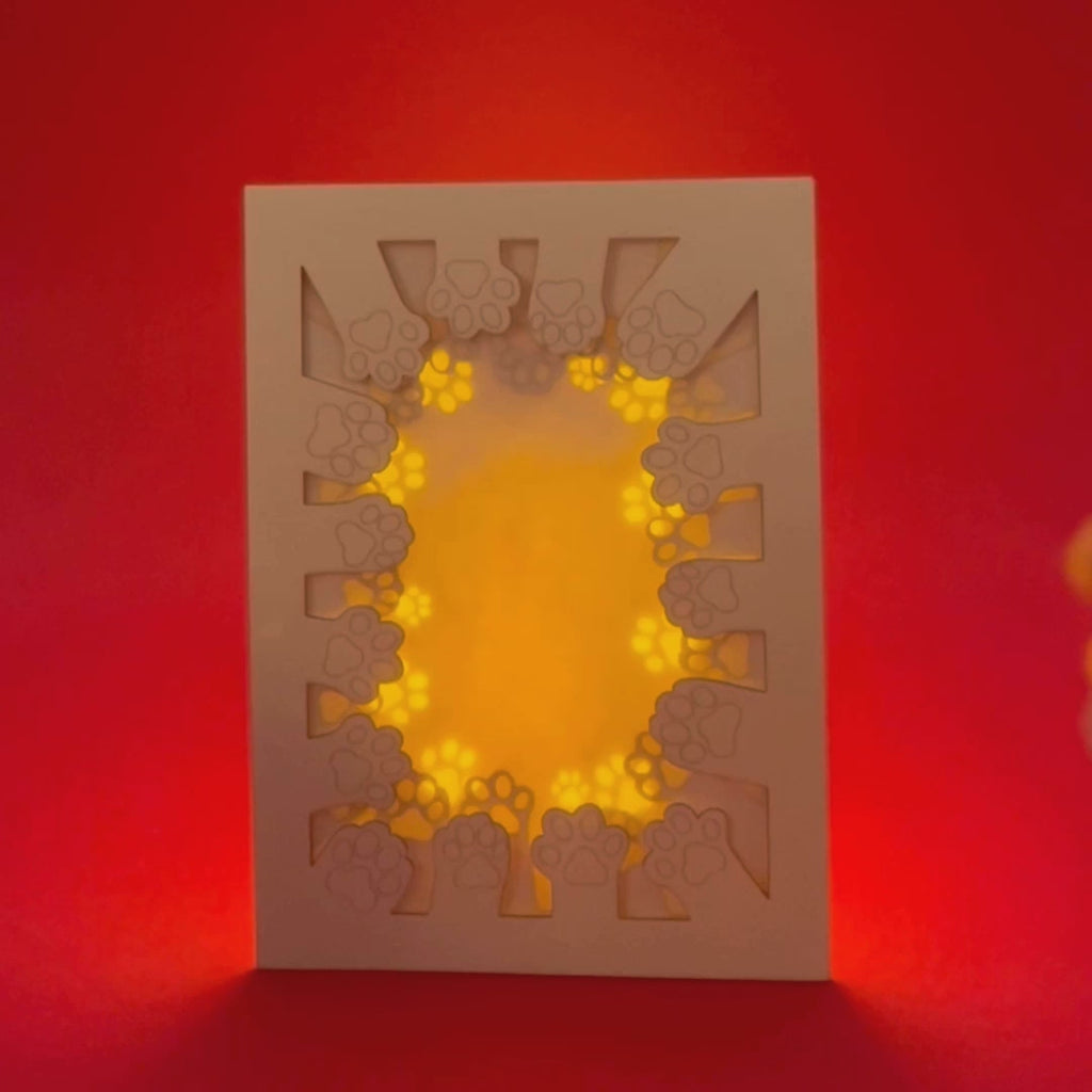 Circle of cat paws with plenty of space to add your wishes